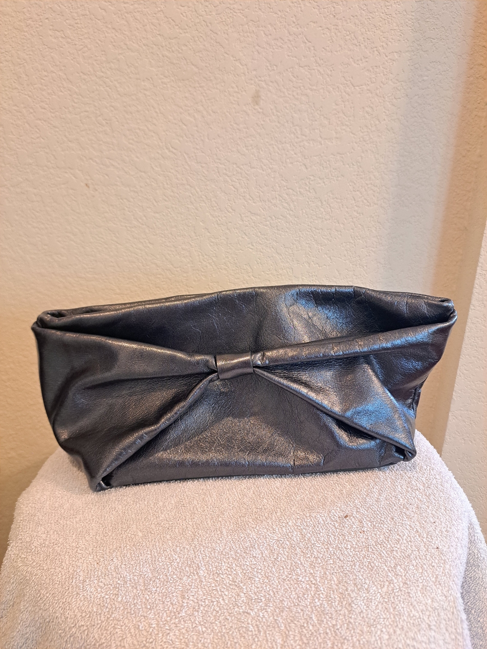 Reformation Metallic Ruched Bow Leather Clutch Bag